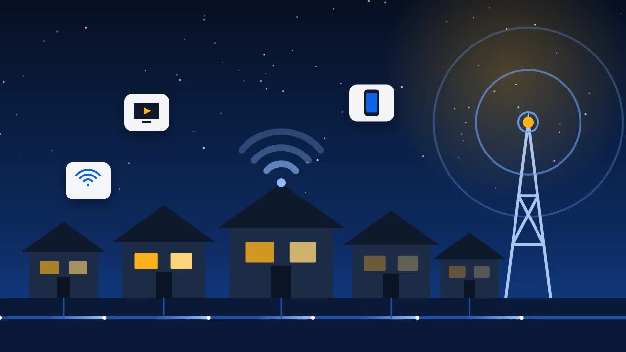 Illustration of a neighborhood at night connected by fiber and a cell tower